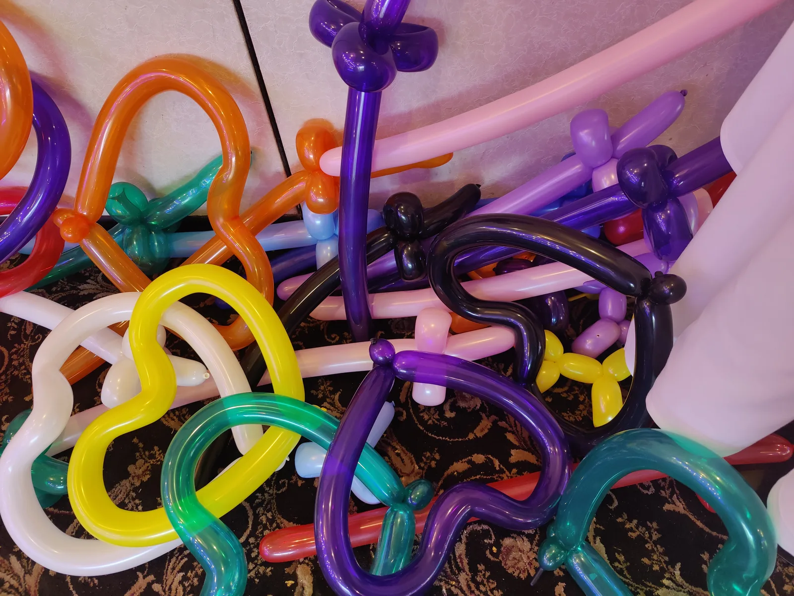 A collection of colorful twisted balloon sculptures