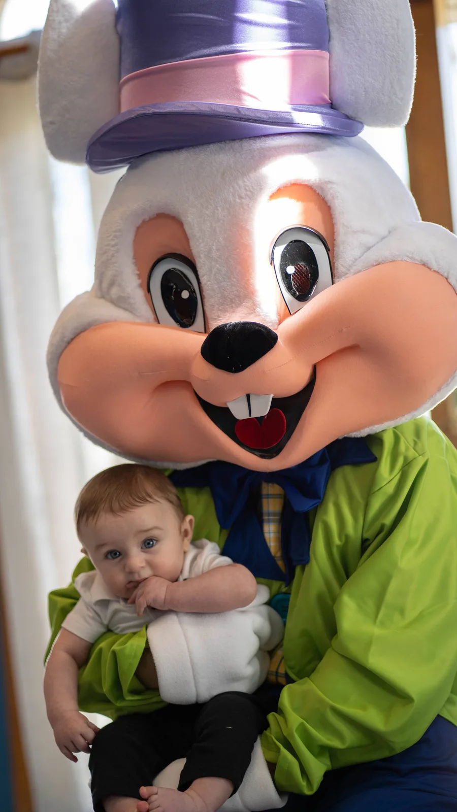 An Easter Bunny performer visiting with a baby