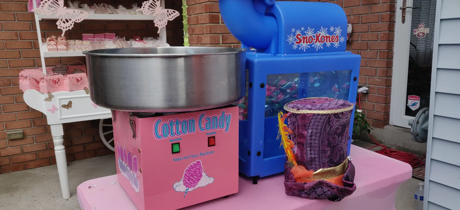 A cotton-candy and snow-cone station set up for a party